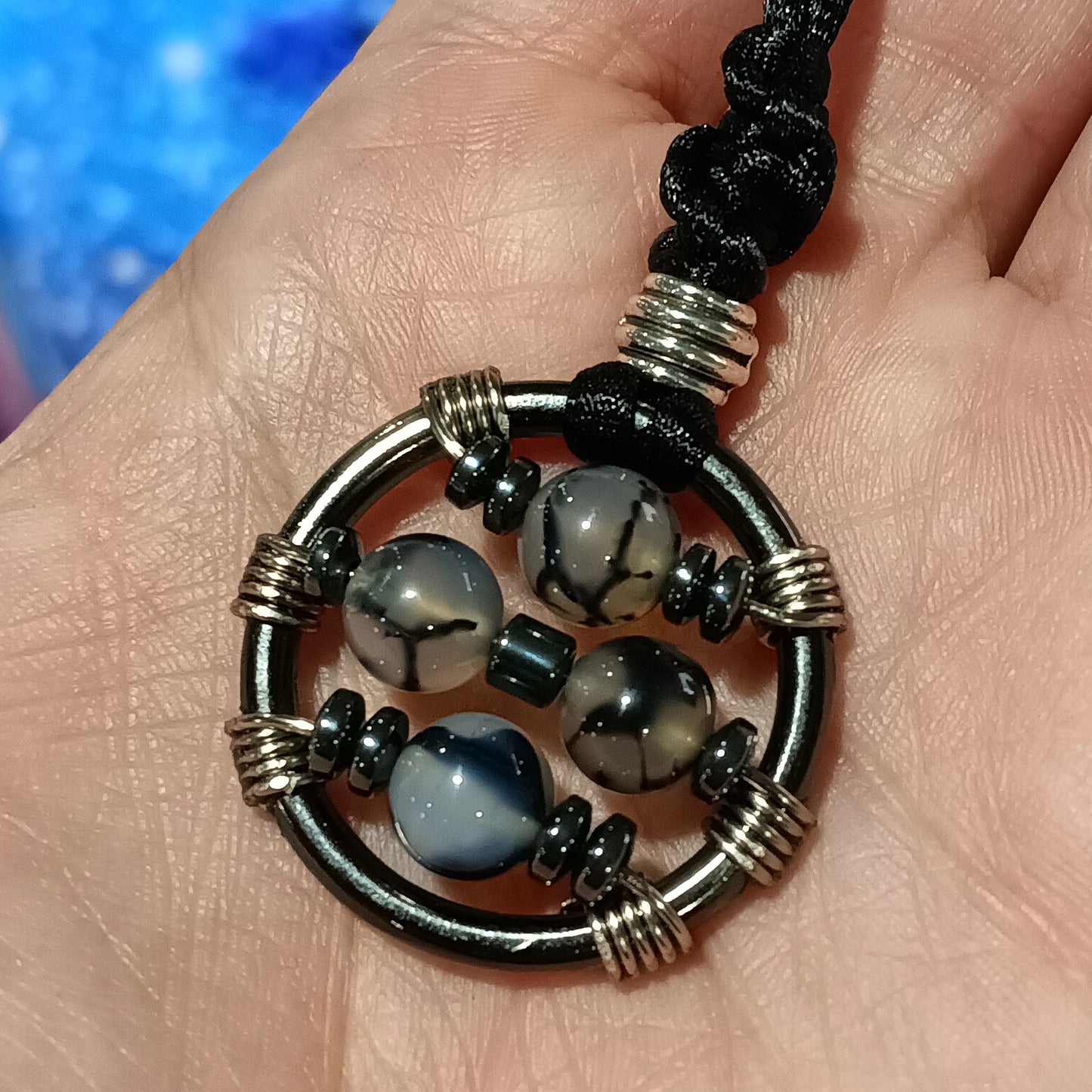 Snake Agate and Hematite Sun Cross Fidget